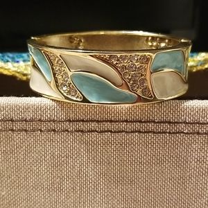 ocean colored wave bracelet with glimmering gems